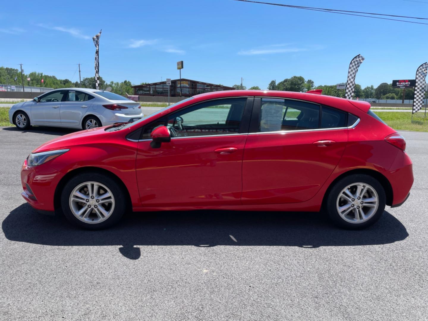 2017 Red Chevrolet Cruze (3G1BE6SM5HS) with an 4-Cyl, Turbo, 1.4 Liter engine, Automatic, 6-Spd transmission, located at 8008 Warden Rd, Sherwood, AR, 72120, (501) 801-6100, 34.830078, -92.186684 - Photo#4